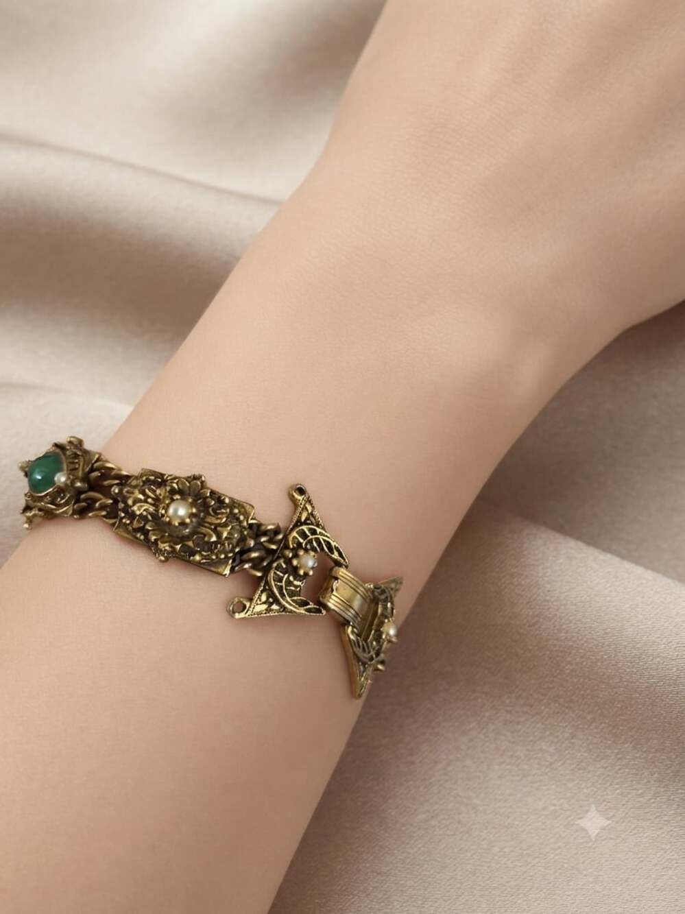 vintage gold tone panel bracelet green stone accents and faux pearl details